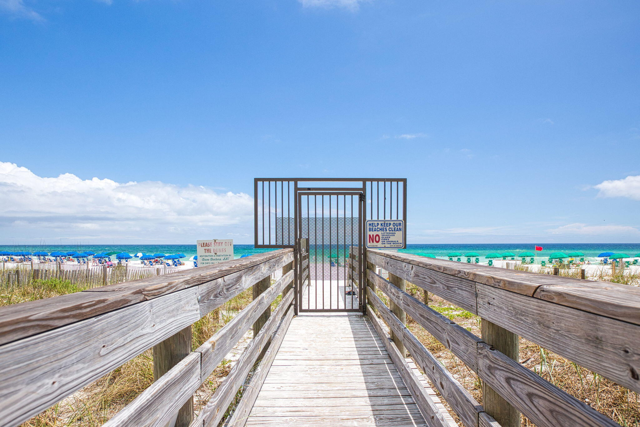 1044 Highway 98, Unit 101 Destin, FL 32541 - Photo 27 of 33 a view of balcony with wooden floor