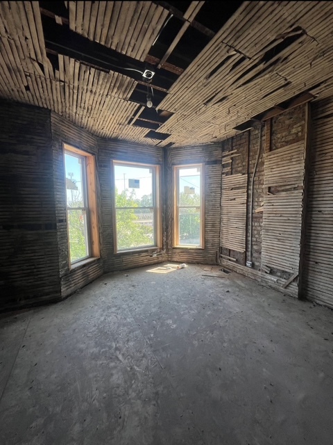 6756 South Lafayette Avenue Chicago, IL 60621 - Photo 6 of 16 a view of empty room with windows