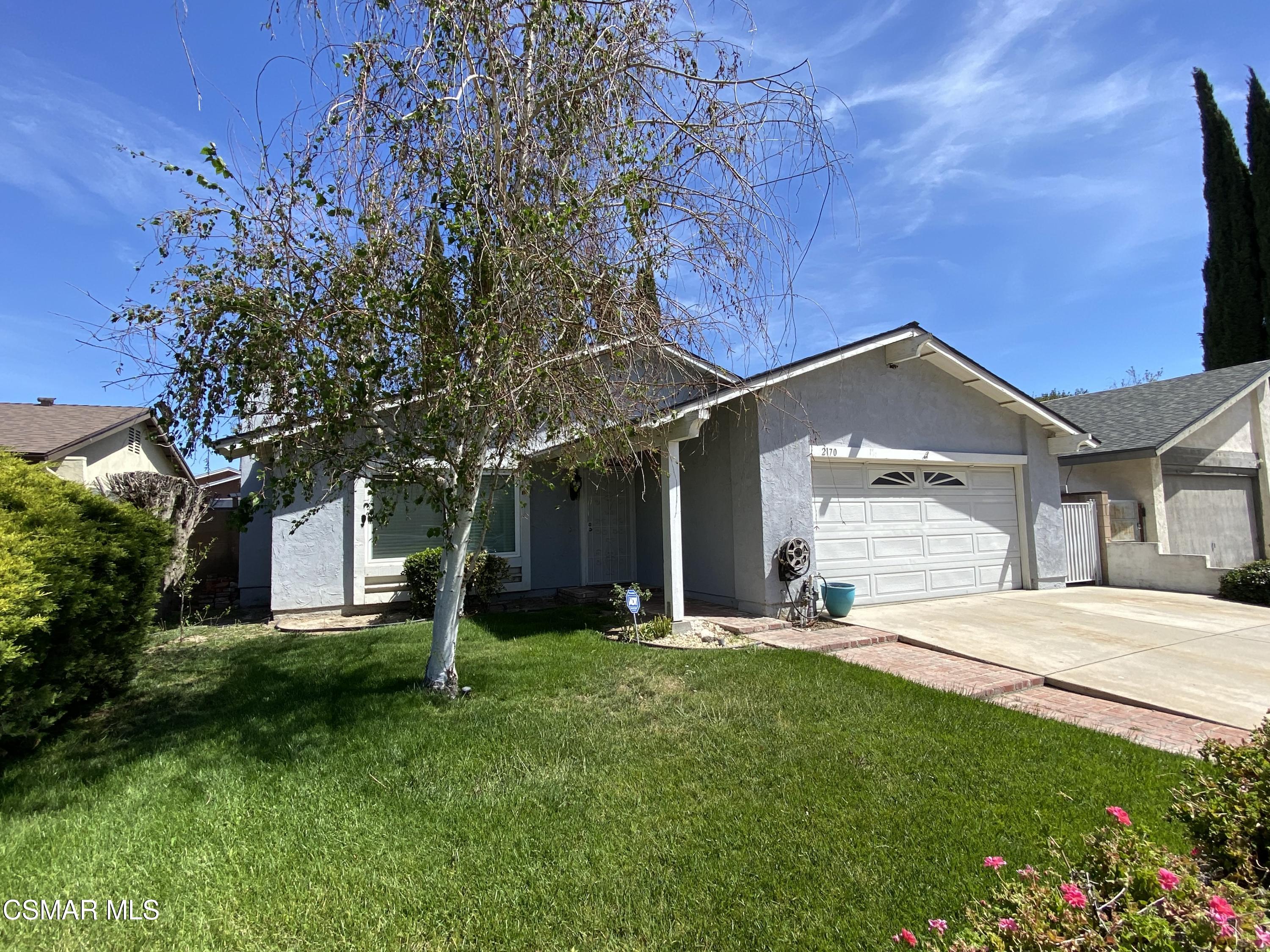 2170 Burrell Avenue Simi Valley, CA 93063 - Photo 2 of 21 a front view of house with yard and green space
