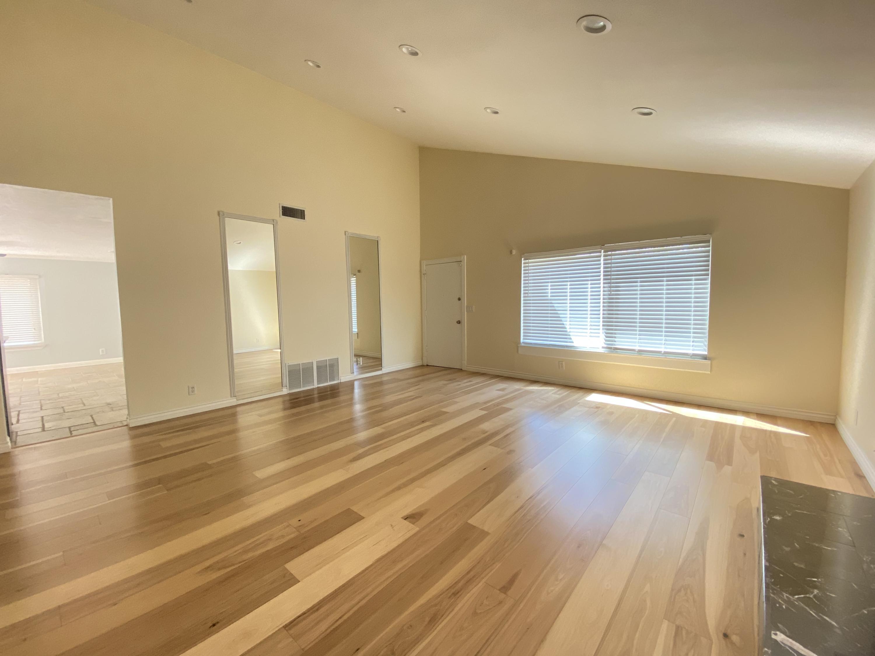 2170 Burrell Avenue Simi Valley, CA 93063 - Photo 11 of 21 an empty room with wooden floor and windows