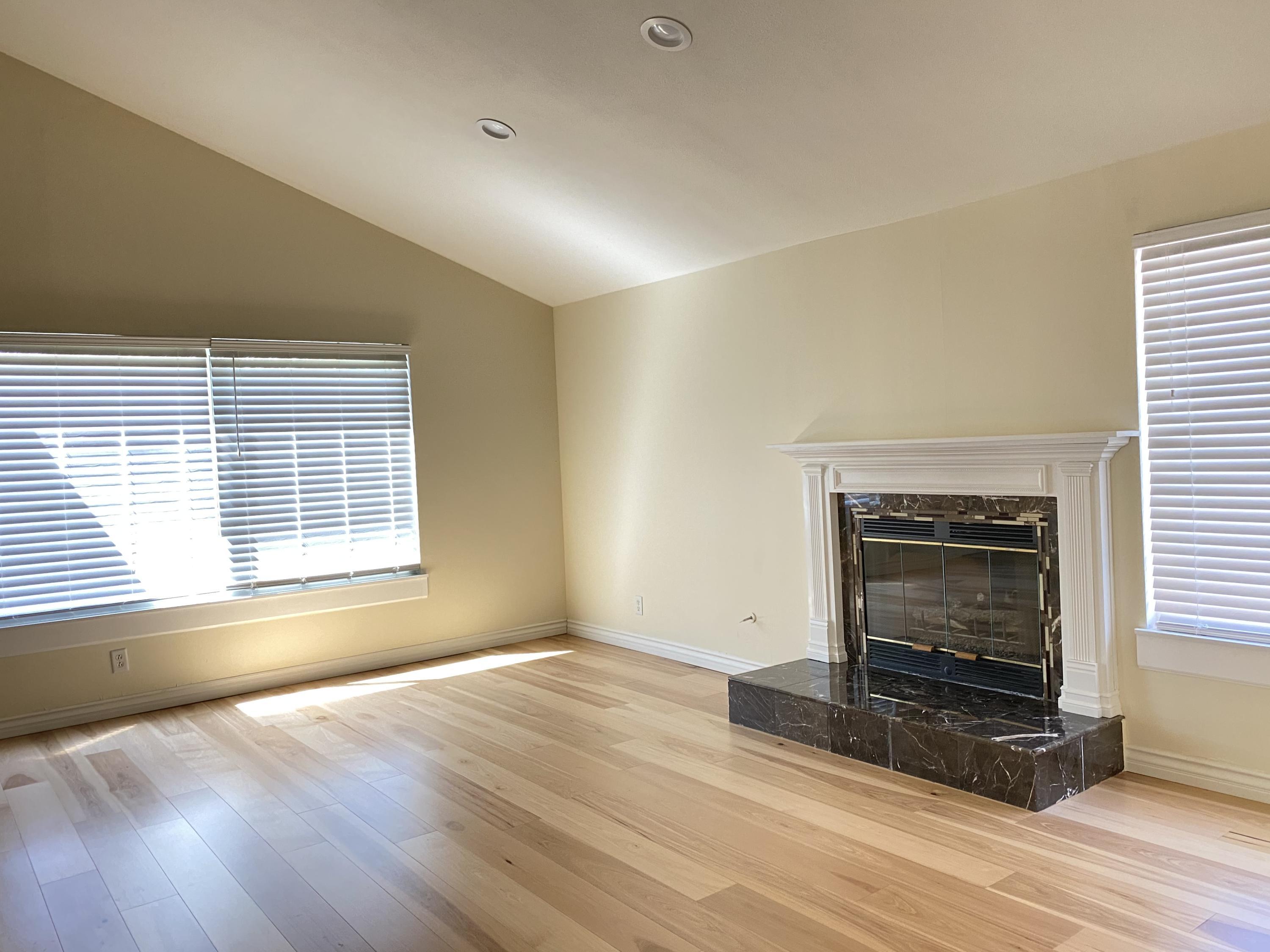 2170 Burrell Avenue Simi Valley, CA 93063 - Photo 13 of 21 a view of an empty room with wooden floor and a window