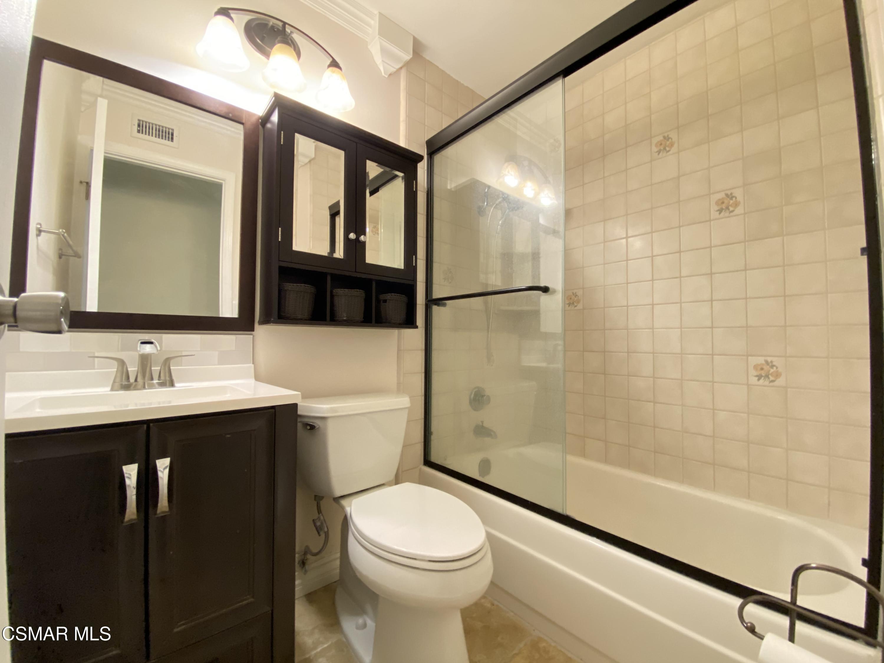 2170 Burrell Avenue Simi Valley, CA 93063 - Photo 15 of 21 a bathroom with a sink toilet and shower