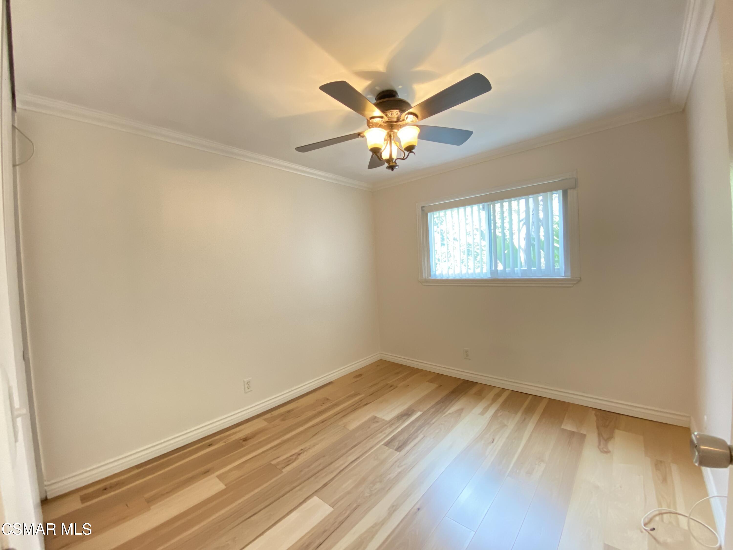 2170 Burrell Avenue Simi Valley, CA 93063 - Photo 16 of 21 wooden floor in an empty room with a window