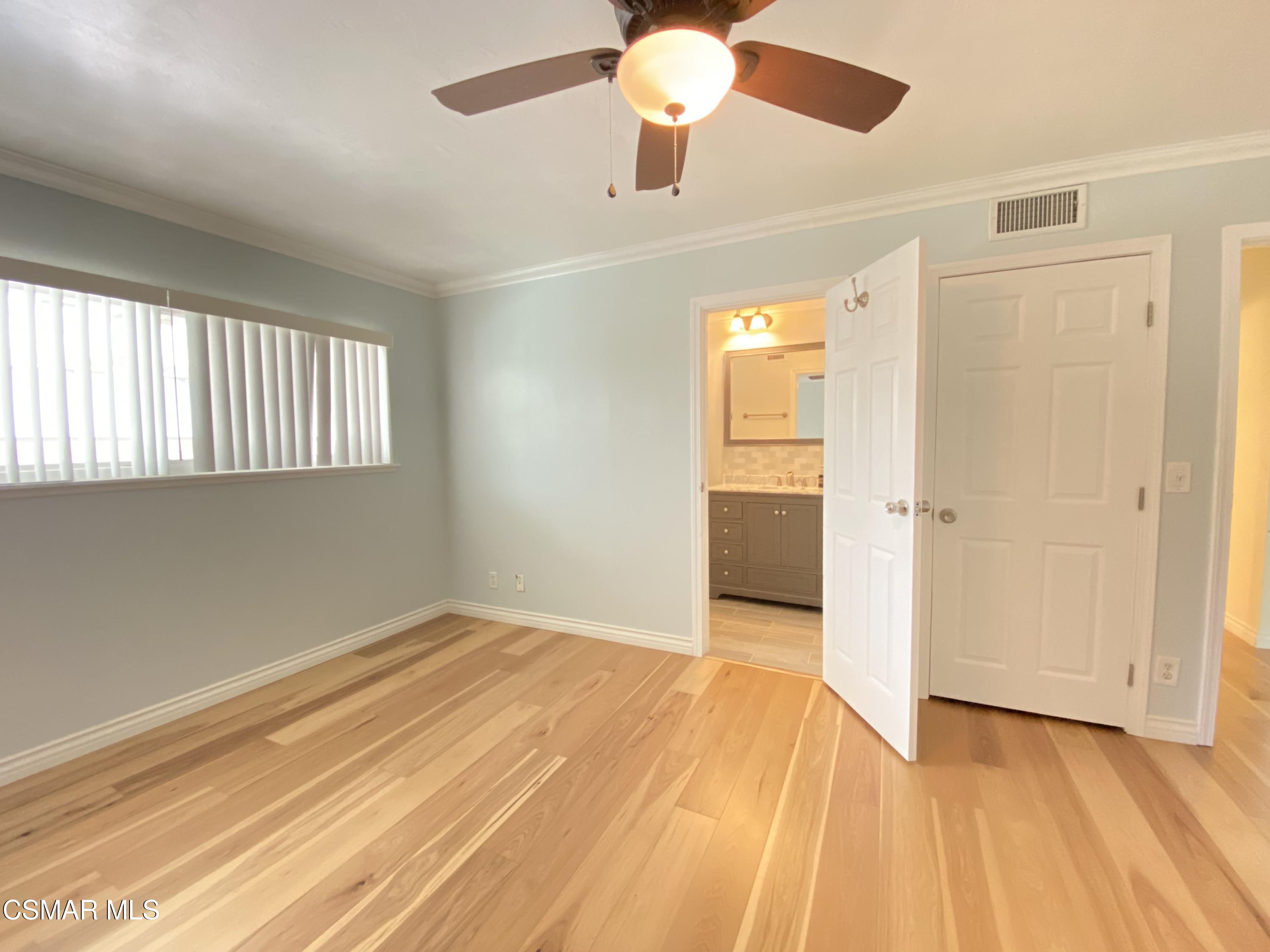 2170 Burrell Avenue Simi Valley, CA 93063 - Photo 18 of 21 wooden floor in an empty room with a window