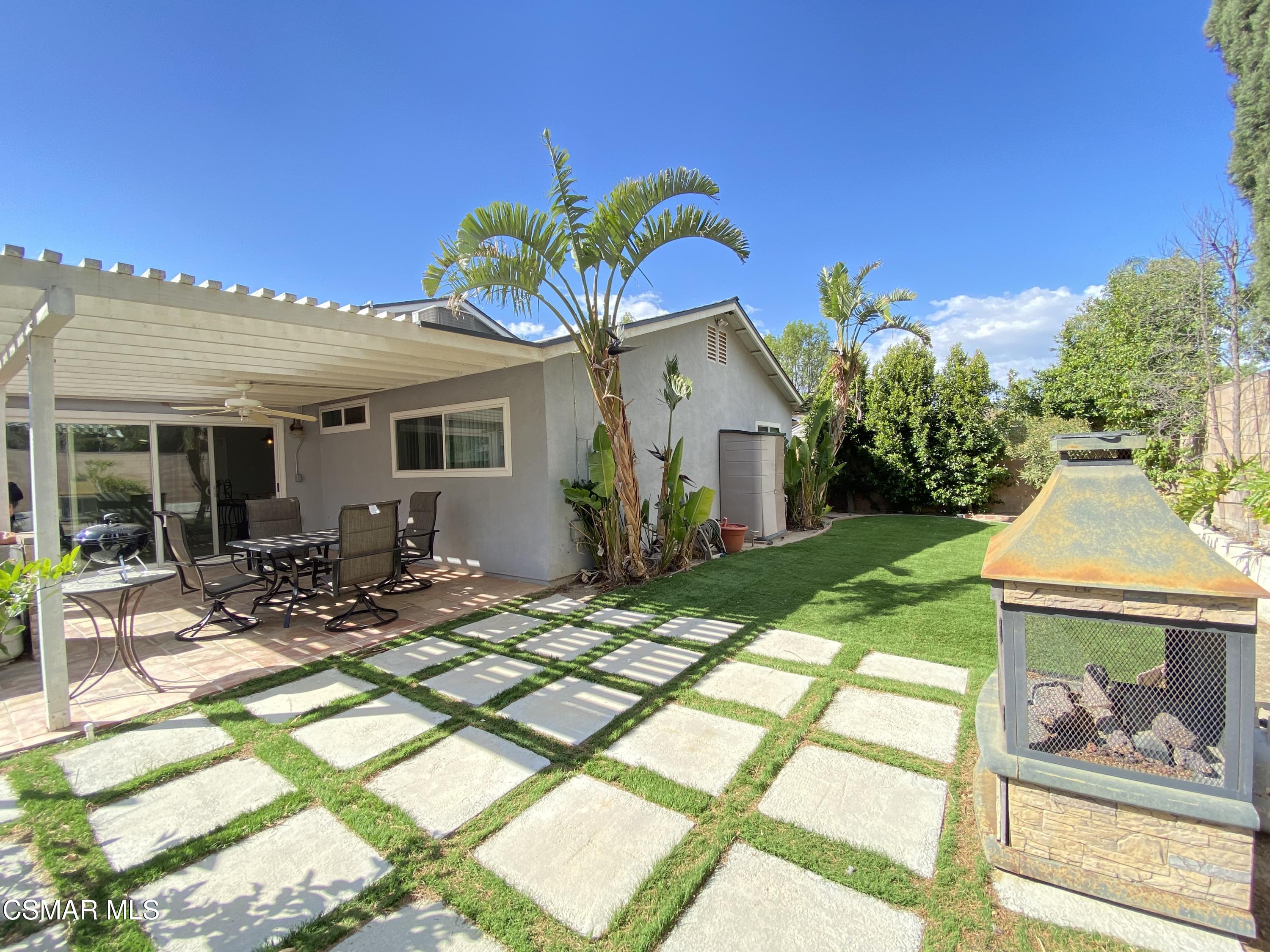 2170 Burrell Avenue Simi Valley, CA 93063 - Photo 21 of 21 a view of a house with backyard sitting area and garden