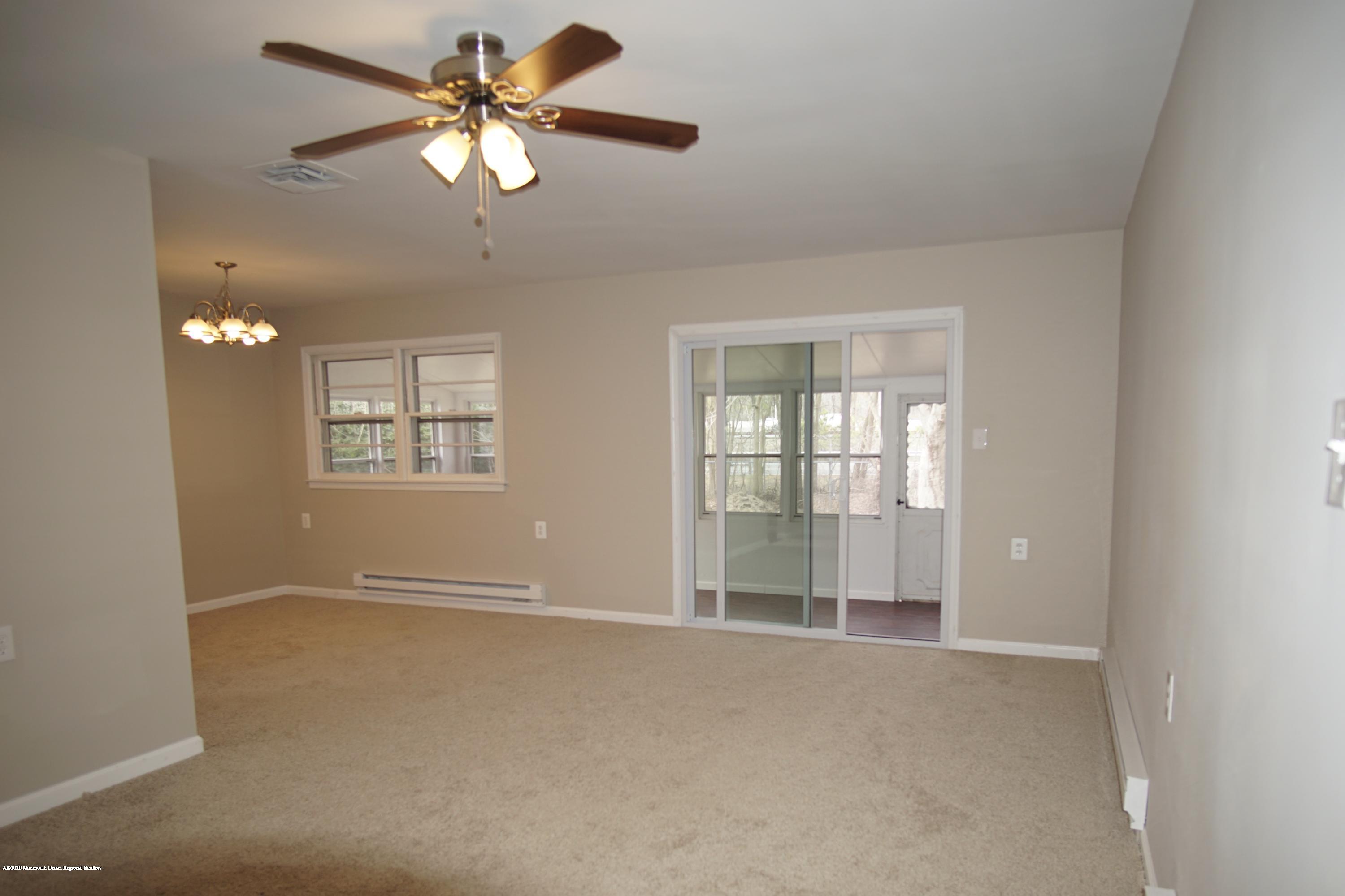 49 Markham Road Brick, NJ 08724 - Photo 3 of 13 a view of an empty room with a window