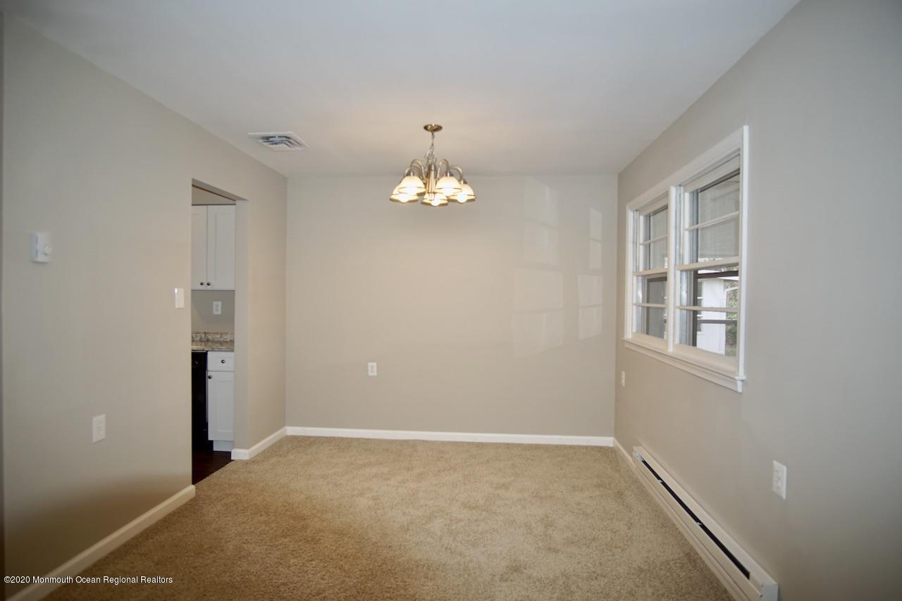 49 Markham Road Brick, NJ 08724 - Photo 4 of 13 wooden floor in an empty room with a window