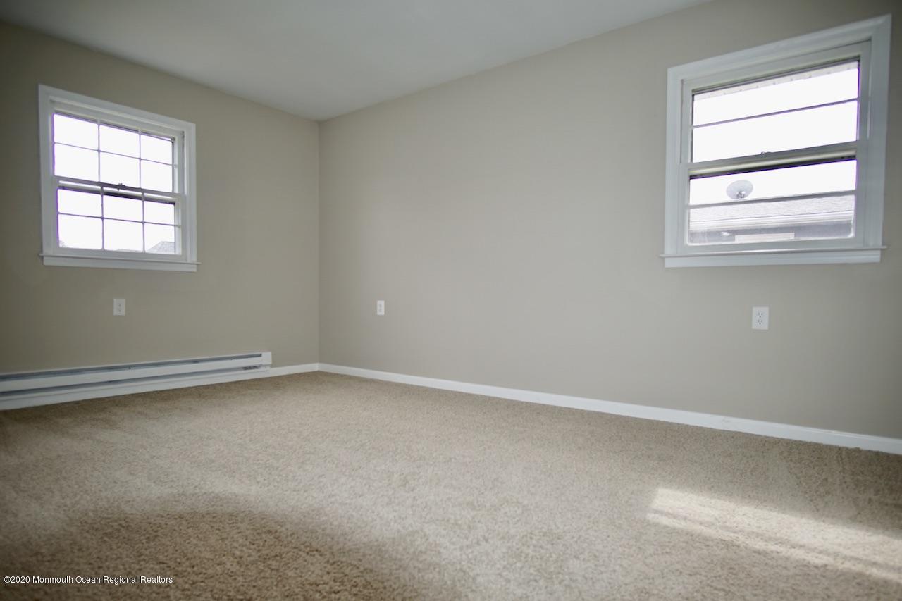 49 Markham Road Brick, NJ 08724 - Photo 7 of 13 an empty room with a window