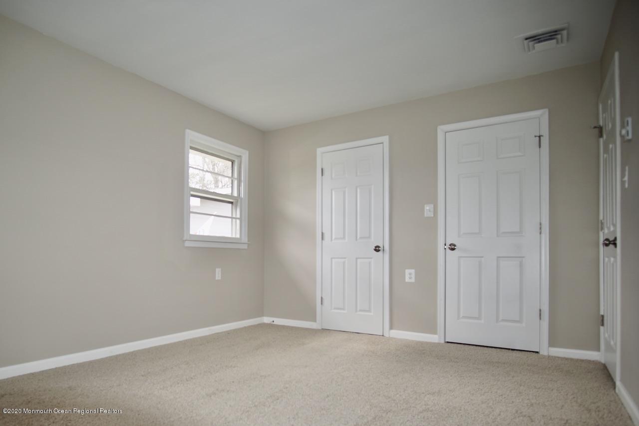 49 Markham Road Brick, NJ 08724 - Photo 8 of 13 a view of an empty room with closet and a window