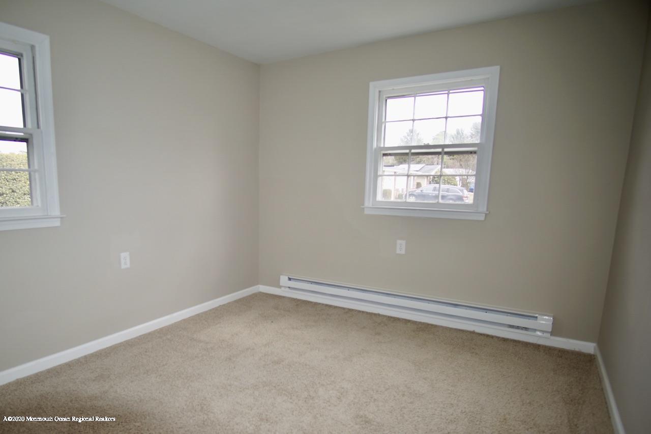 49 Markham Road Brick, NJ 08724 - Photo 10 of 13 an empty room with a window