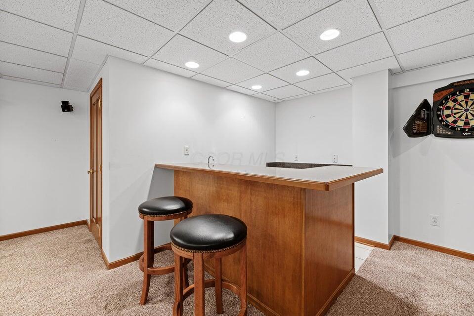 9909 Hoover Woods Road Galena, OH 43021 - Photo 39 of 50 Bar in lower level