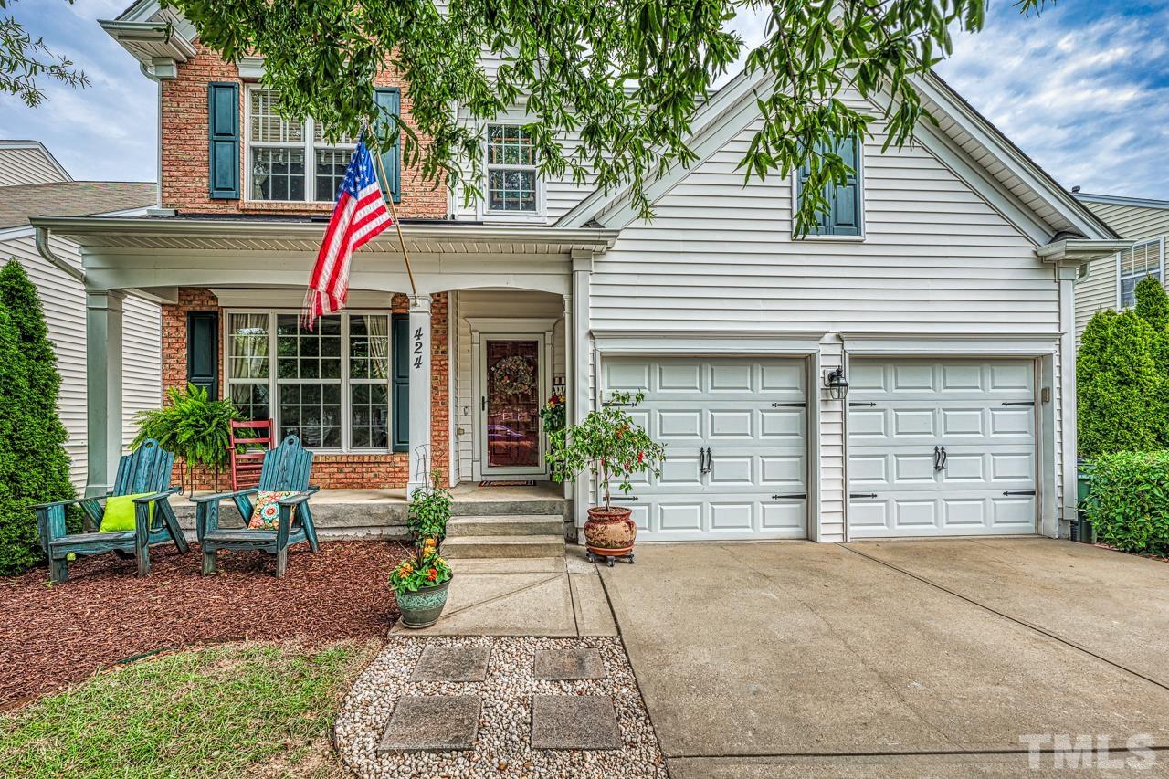 Welcome Home!  Sit on your rocking chair porch or your shaded front lawn.