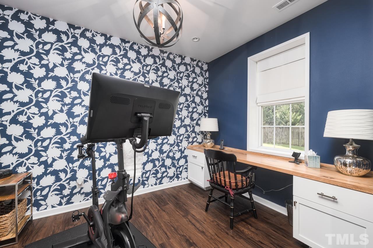 424 Willingham Road Morrisville, NC 27560 - Photo 22 of 30 Barn doors for privacy. Beautiful accent wall. "Love it or List it" HGTV show designed/built