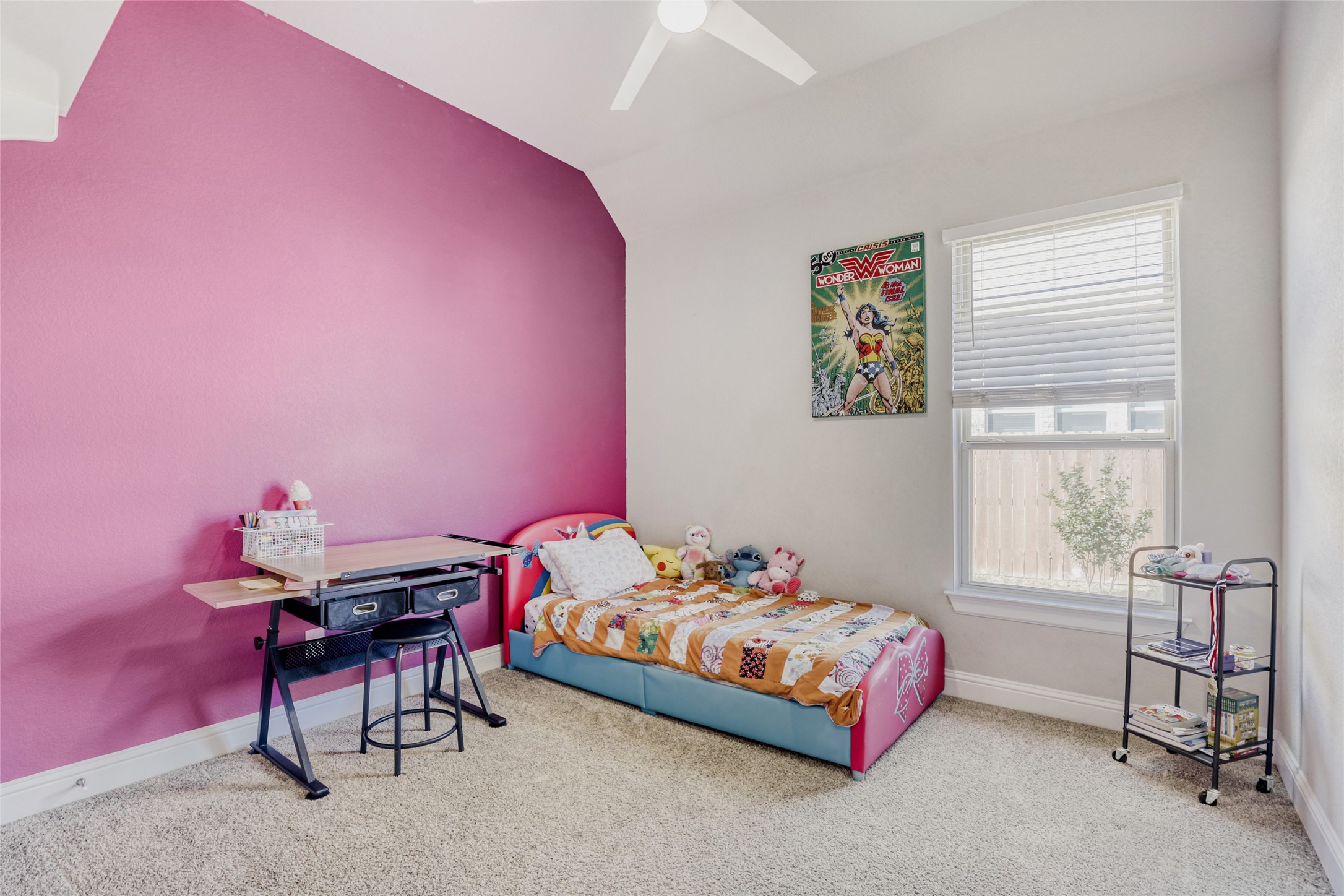 125 Buffalo View Lane Georgetown, TX 78628 - Photo 20 of 28 a bedroom with a bed a table and chair