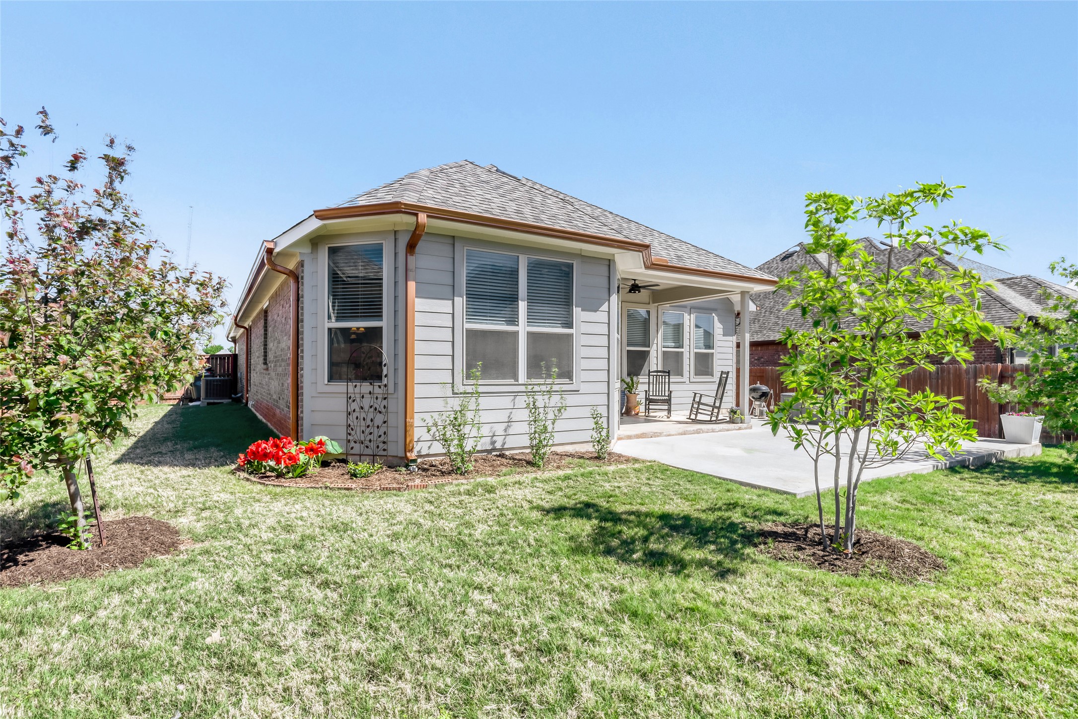 125 Buffalo View Lane Georgetown, TX 78628 - Photo 25 of 28 a front view of a house with garden