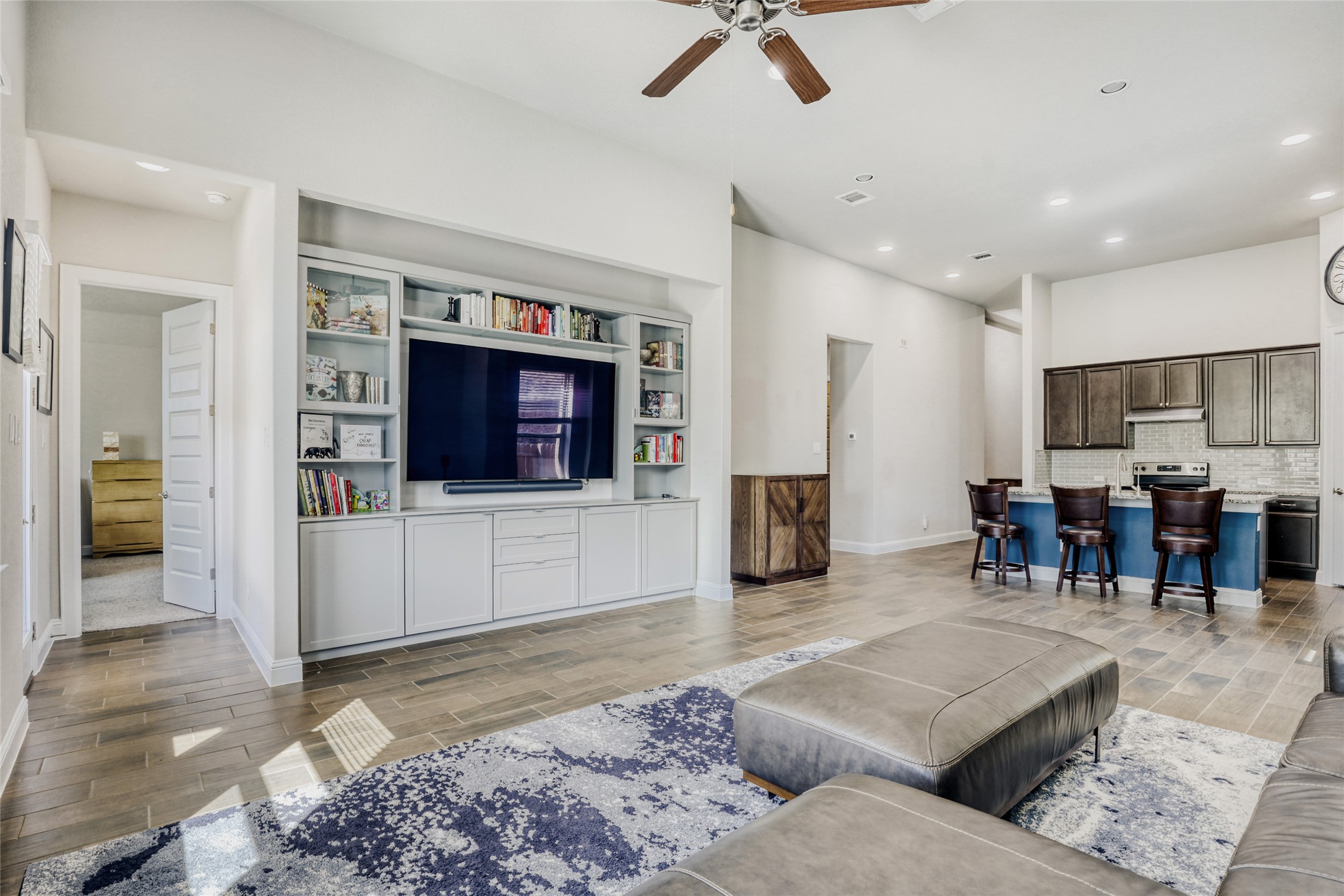 125 Buffalo View Lane Georgetown, TX 78628 - Photo 4 of 28 a living room with furniture and a flat screen tv