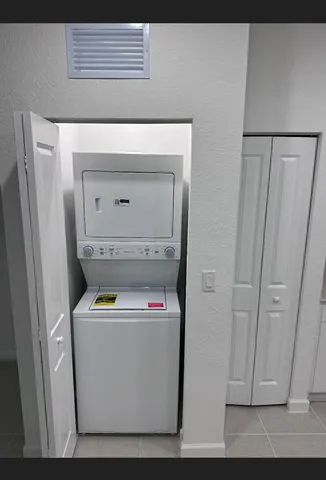 a utility room with a washer and dryer