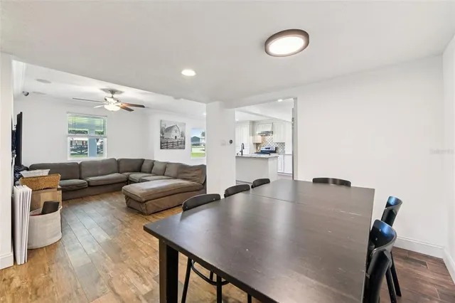 a view of a livingroom with wooden floor