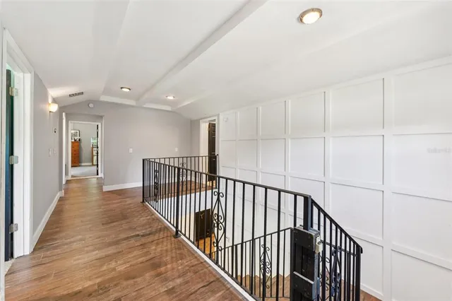a front view of a house with a yard table and chairs