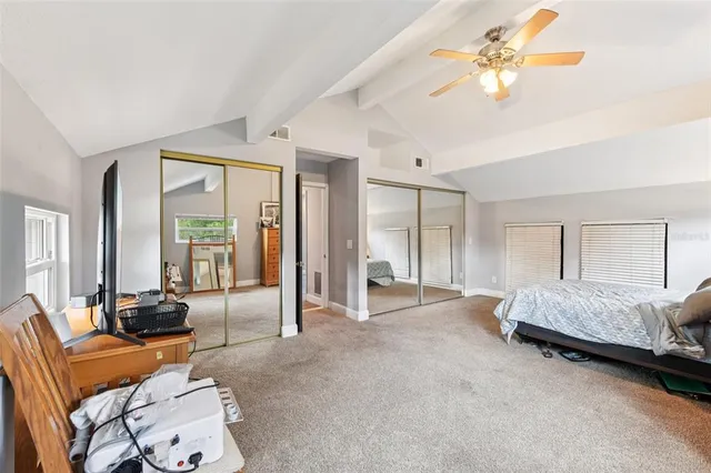 an aerial view of a house with a garden