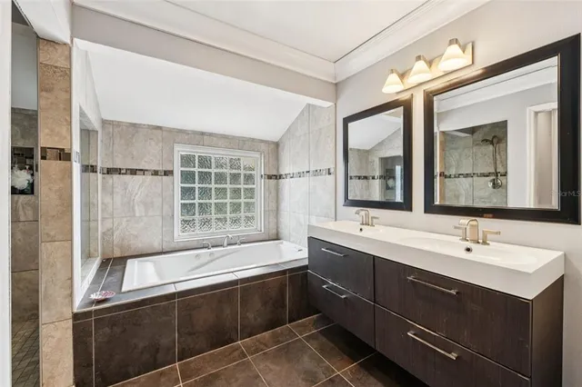 an aerial view of a house with a garden