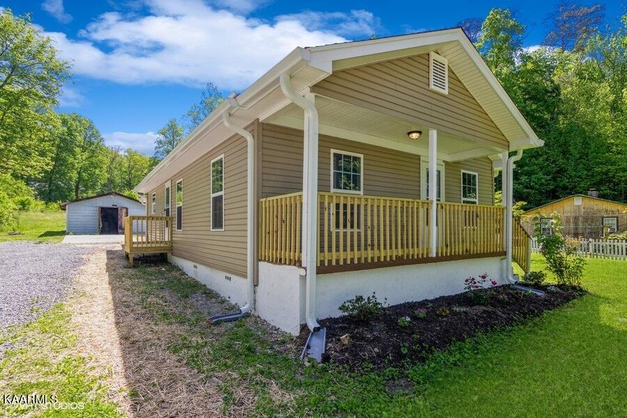 571 Half Moon Road Oliver Springs, TN 37840 - Photo 2 of 14 02_571HalfMoonRd_2002_LowRes