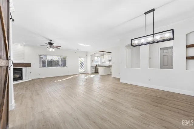 a view of an entryway with wooden floor