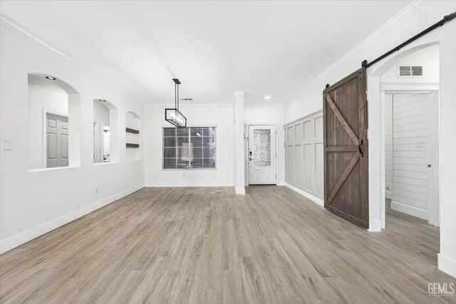 a view of a kitchen and a fireplace