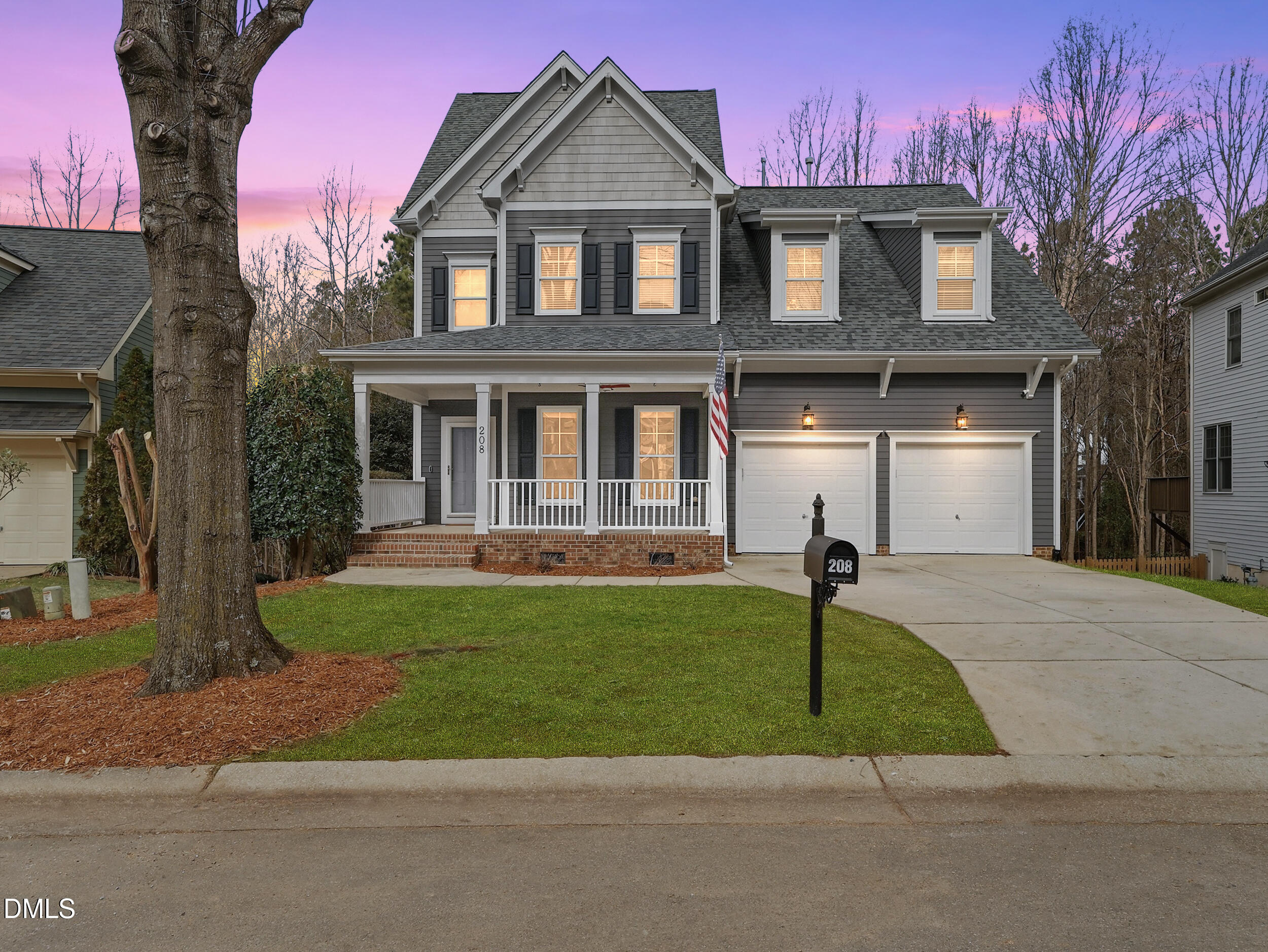 208 Brookberry Road Holly Springs, NC 27540 - Photo 1 of 32 a front view of a house with a yard