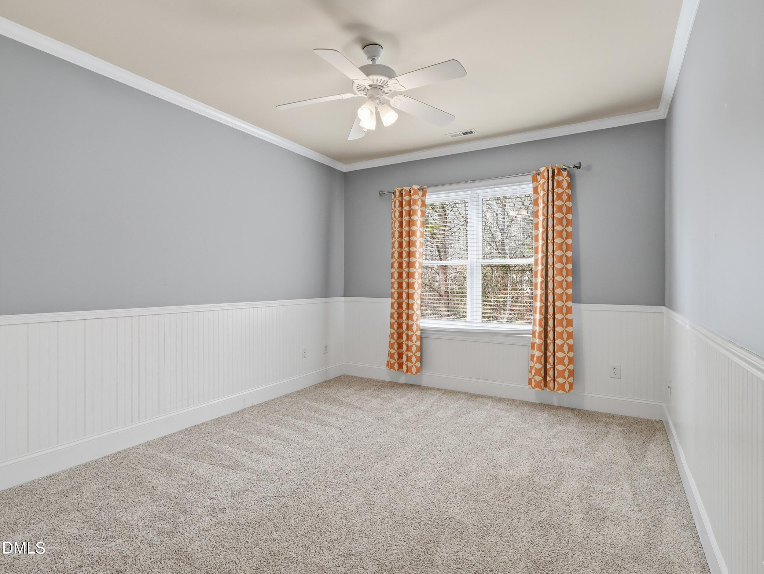 208 Brookberry Road Holly Springs, NC 27540 - Photo 17 of 32 a view of an empty room with a window