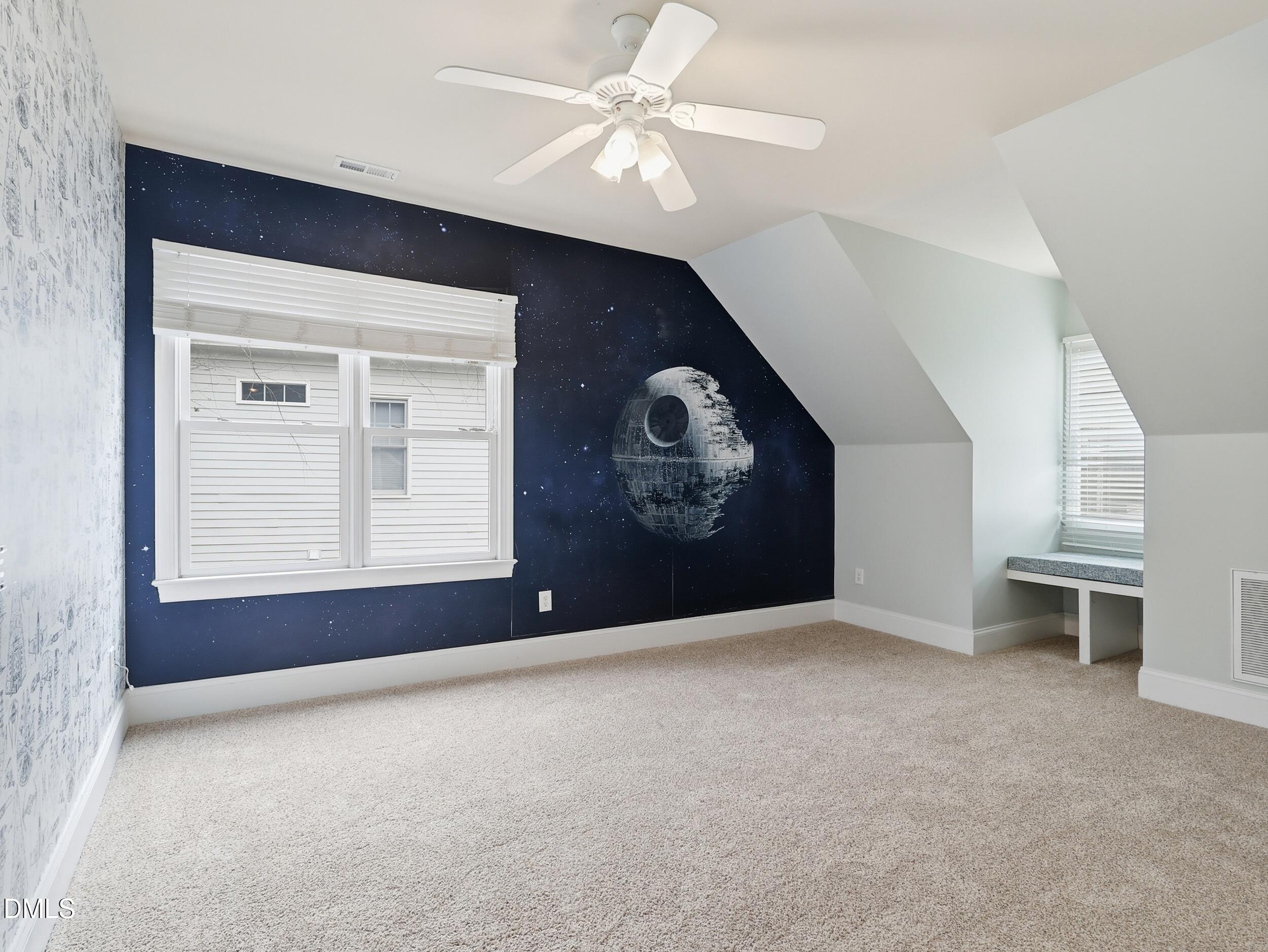 208 Brookberry Road Holly Springs, NC 27540 - Photo 18 of 32 an empty room with windows and fan