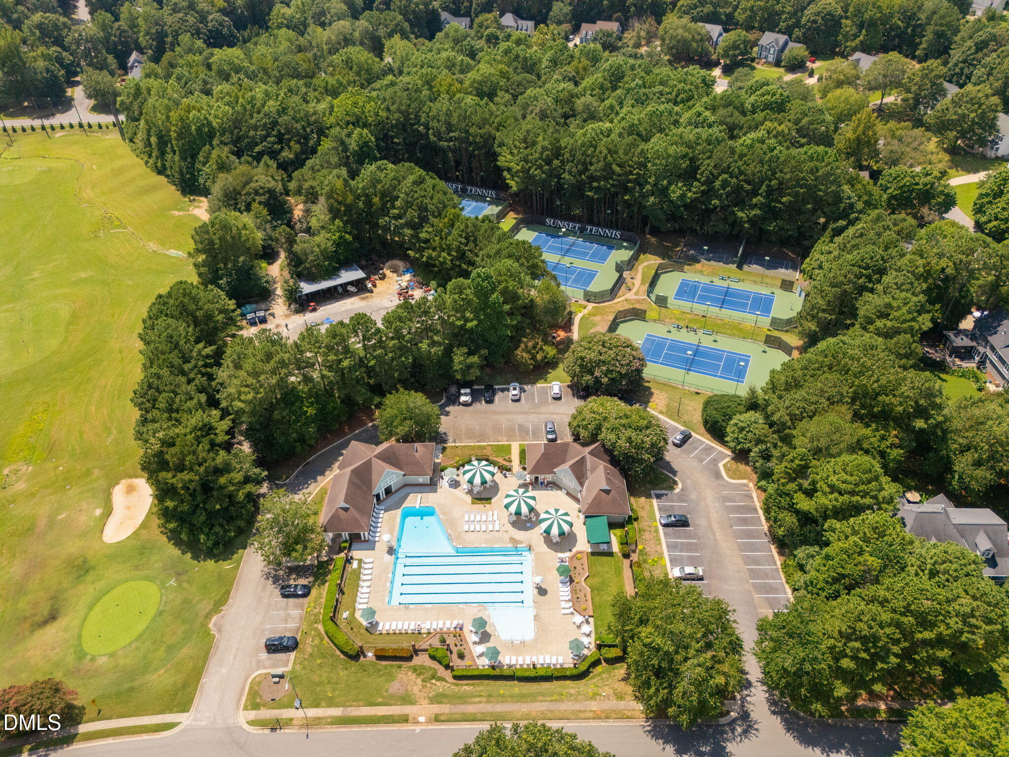 208 Brookberry Road Holly Springs, NC 27540 - Photo 27 of 32 an aerial view of residential houses with outdoor space and swimming pool