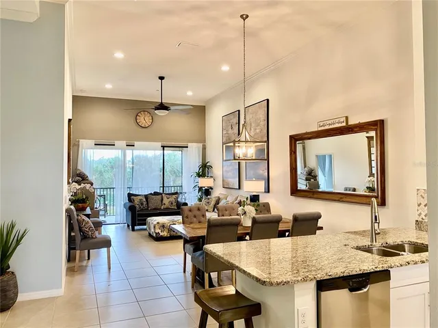 a view of a living room and dining room