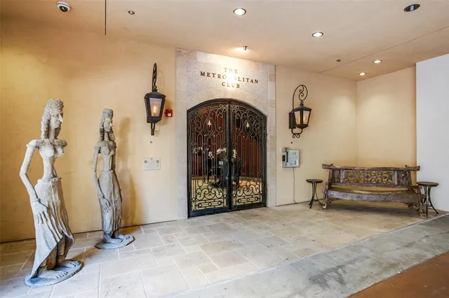 a view of a hallway with stairs