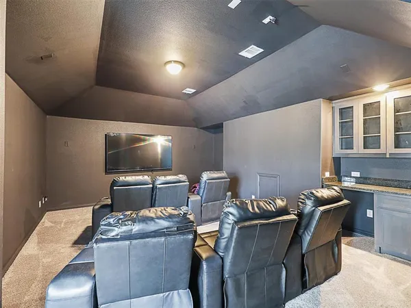a work room with furniture and window
