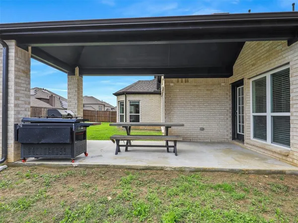a house view with a garden space