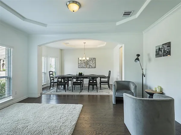 a living room with furniture and a table