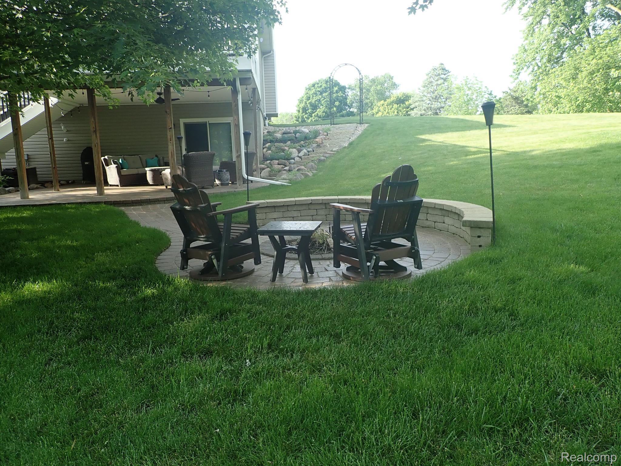 10438 Coolidge Road Goodrich, MI 48438 - Photo 41 of 49 Built in fire pit