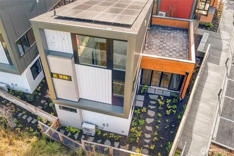 a view of a dining room with furniture and window