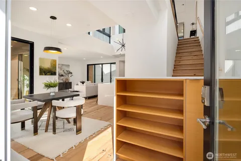 a couple of chairs sitting in front of a house