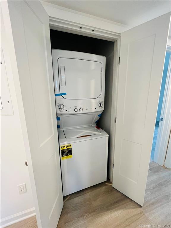 54 School Street Bridgeport, CT 06605 - Photo 8 of 9 a utility room with dryer and washer