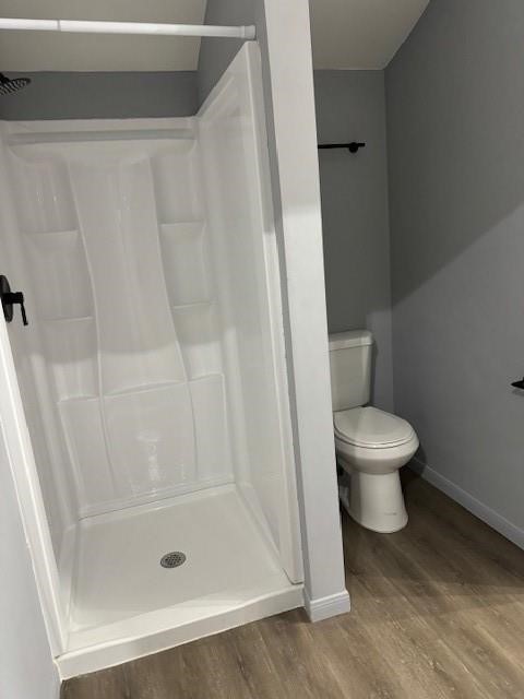 4049 Lucille Street, Unit C Houston, TX 77026 - Photo 12 of 13 a bathroom with a shower and a toilet