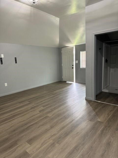4049 Lucille Street, Unit C Houston, TX 77026 - Photo 2 of 13 an empty room with wooden floor & windows