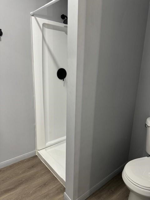 4049 Lucille Street, Unit C Houston, TX 77026 - Photo 10 of 13 a bathroom with a granite countertop toilet and a shower