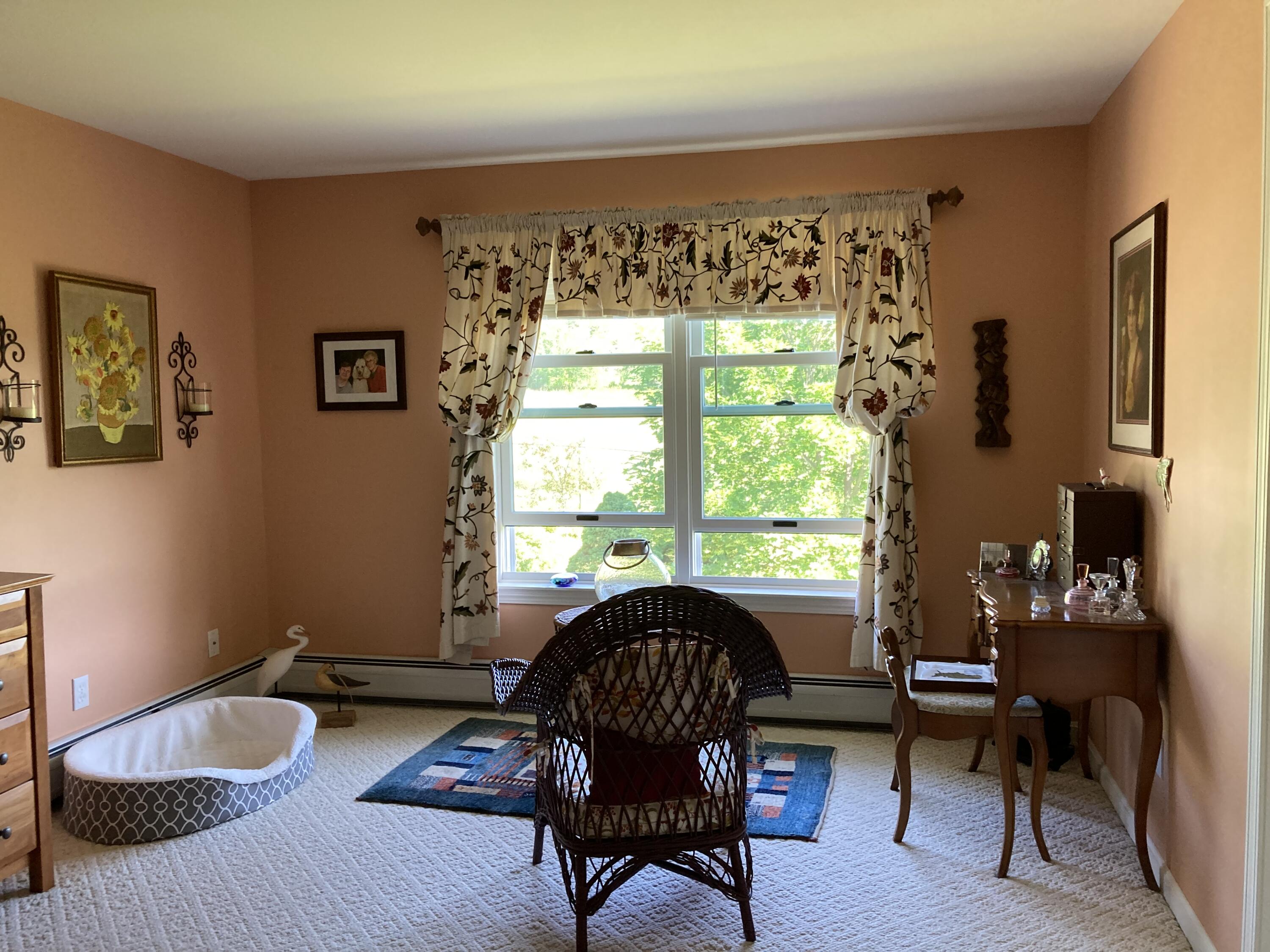 32 Boulder Cv Way Lamoine, ME 04605 - Photo 11 of 37 Sitting area, primary bedroom.