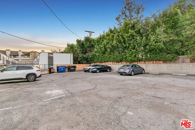 a view of cars parked in a parking lot