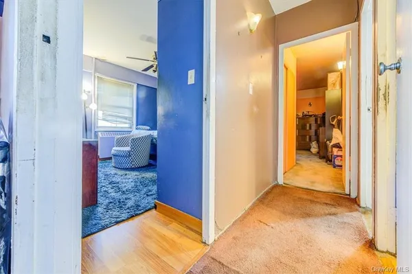 a bed room with a bed and a television