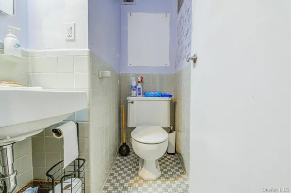 a bathroom with a granite countertop window