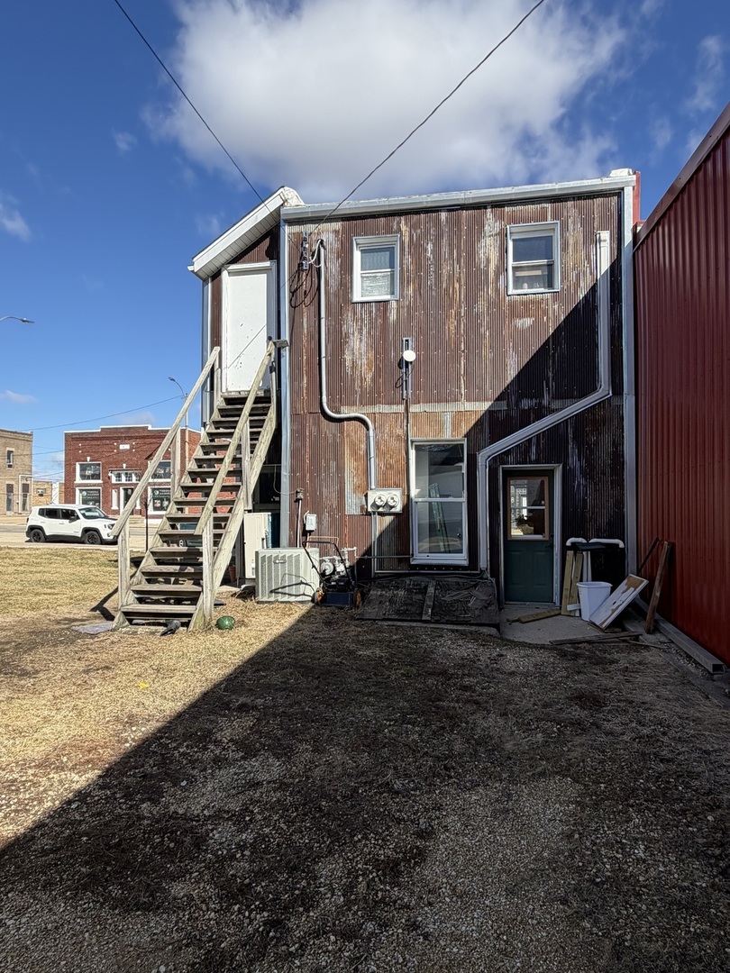 13 East Market Street Shannon, IL 61078 - Photo 12 of 13 a view of a house with backyard