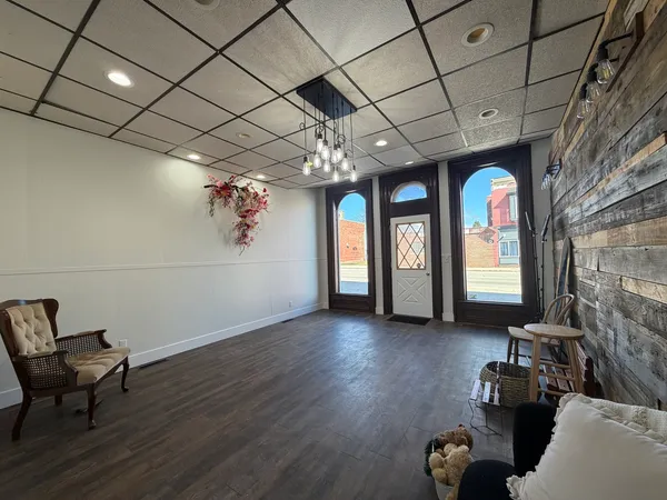 a view of livingroom with furniture and a window